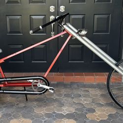 Custom Built Chopper Bike. Rides Excellent!! Custom Paint. Inter Grated Kick Stand Holder. Entire frame and handlebars made of square tube. Side exhau