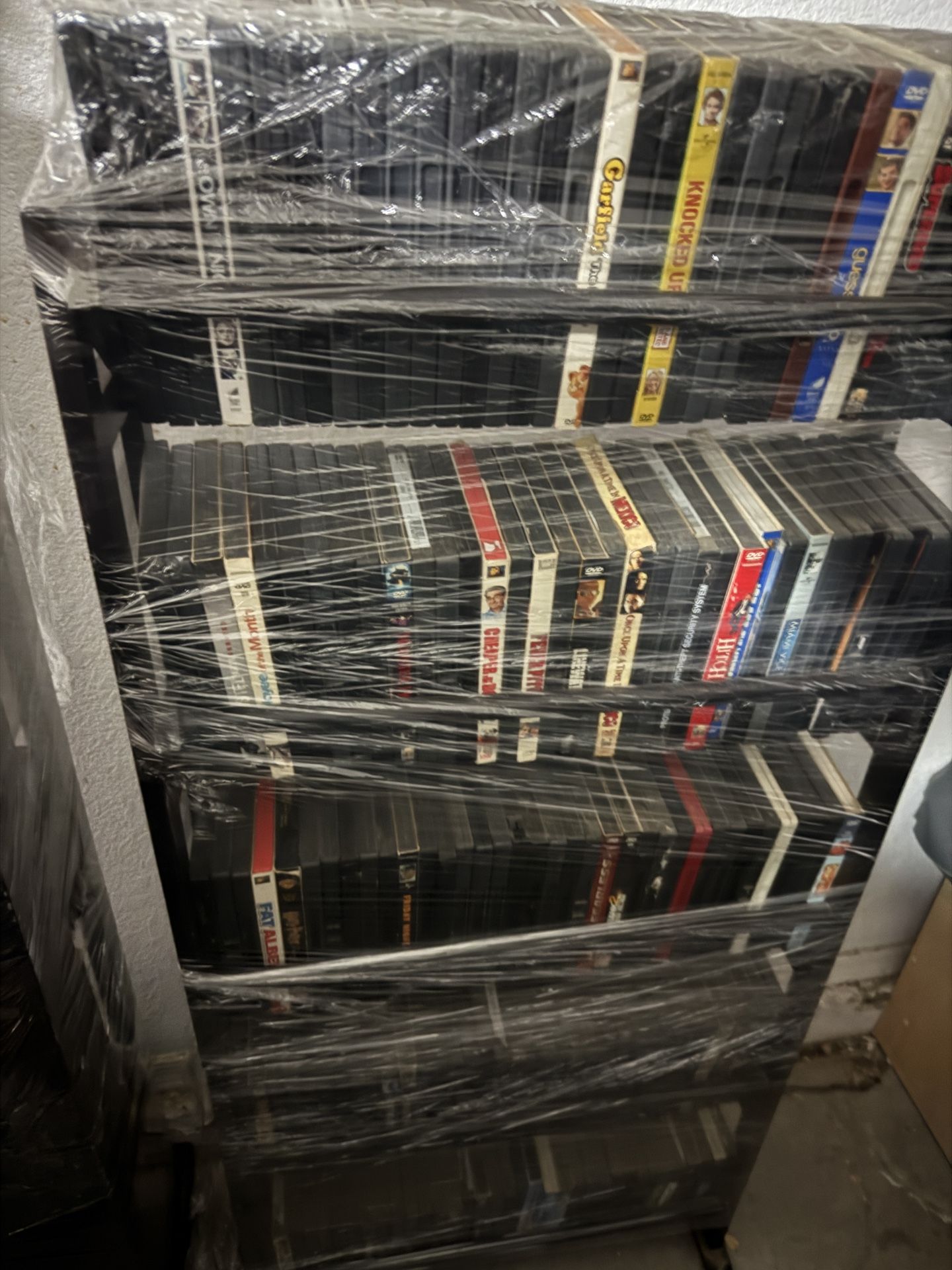 4 + Containers Of DVDs