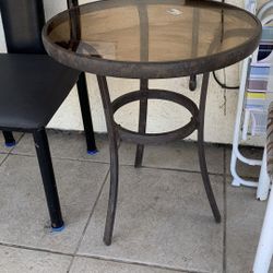 Glass coffee table outside 