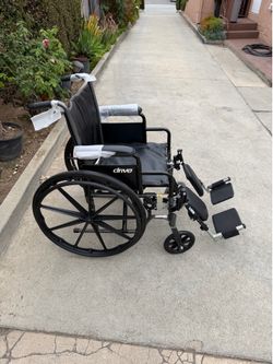 18 inches wide wheelchair in excellent condition with legs extended  by drive
