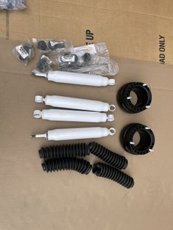 94 - 2013 Dodge Ram 1500/2500/3500 (4WD)Daystar Comfort Ride 2” Suspension Lift Kit With Scorpion Shocks - Part # KC09118BK
