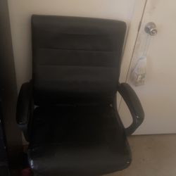 A Black Spinning Office Chair 