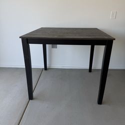 Counter height wood dining table with 4 chairs