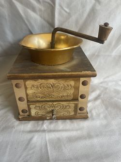 Vintage manual coffee grinder few dents on top