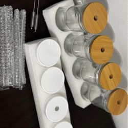 New set of cups, glass, various lids and straws (all included) 