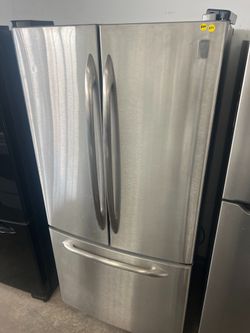 Ge french door refrigerator , stainless steel 33" wide  -free delivery