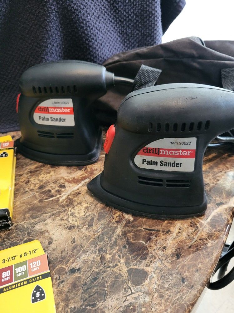 Two electric drill sanders, sand paper, & electric spray gun
