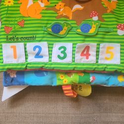 Imagine Station Soft Cloth Fabric Baby Book. Lots Of Animals, Flips & Pull Tabs. Approx 10". East, West, North