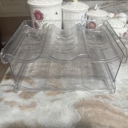 Water bottle storage for cabinet