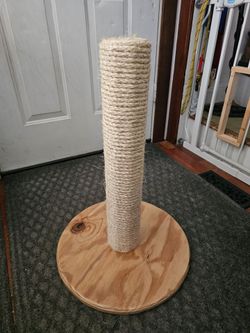 Cat scratch post and dog leash