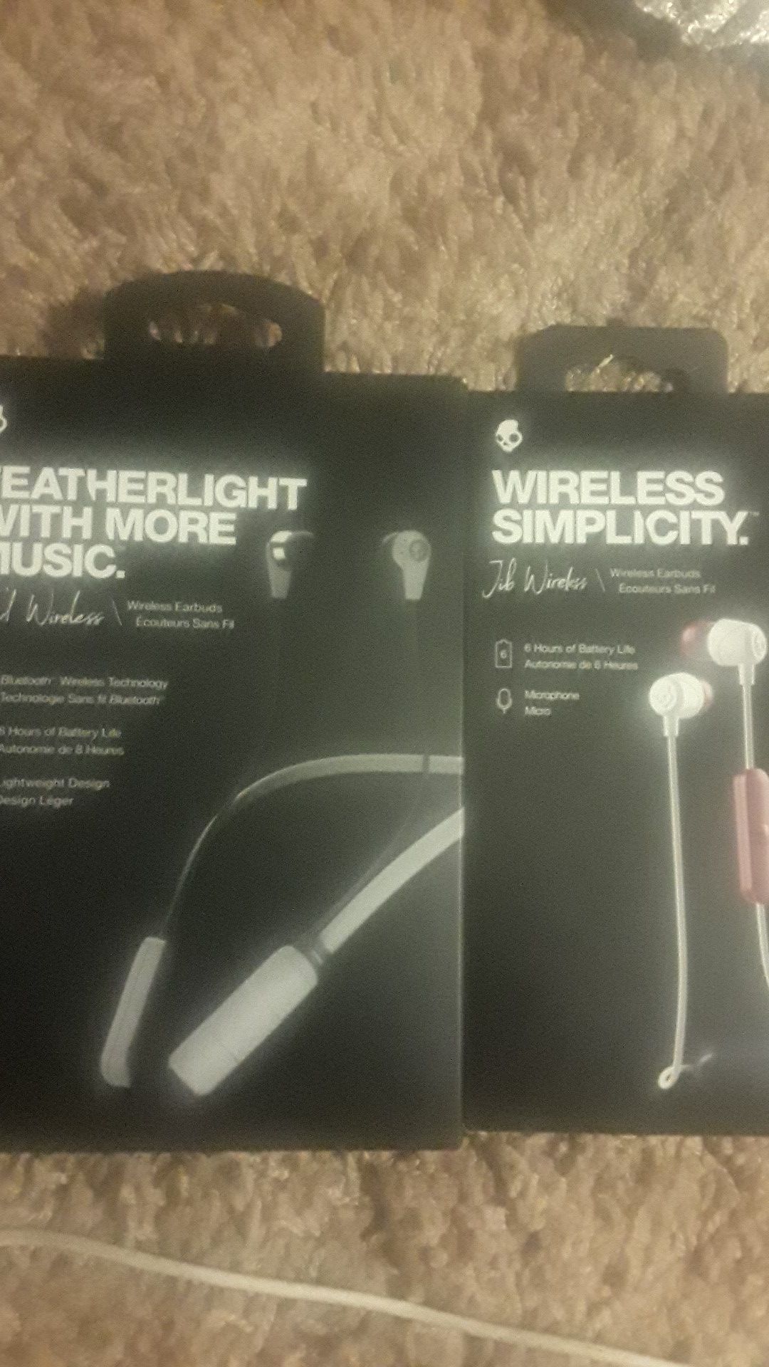 2 Skullcandy wireless earbuds