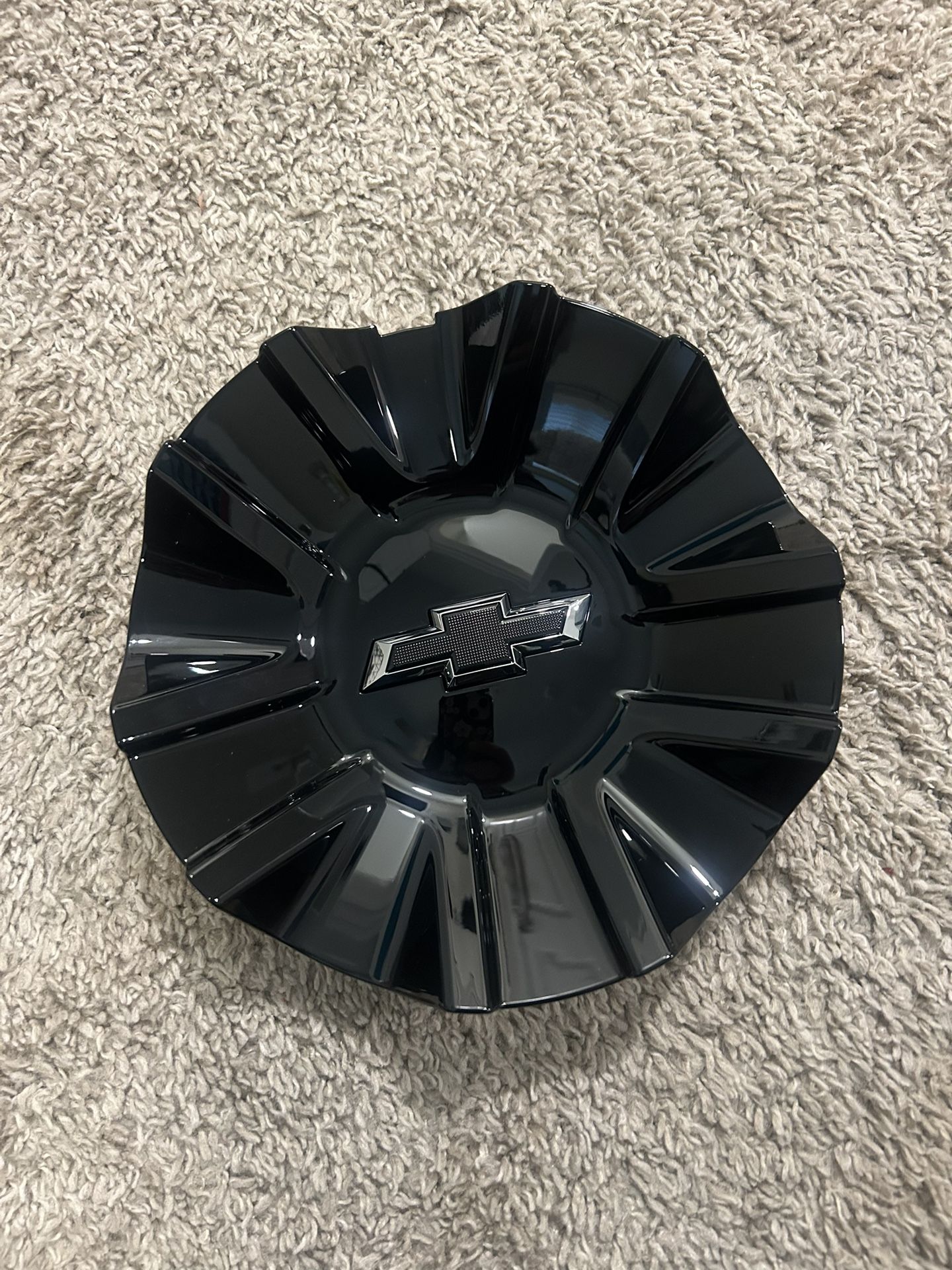 OE Chevy black wheel trim cap
