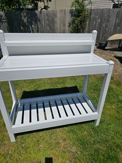 White plastic potting bench
