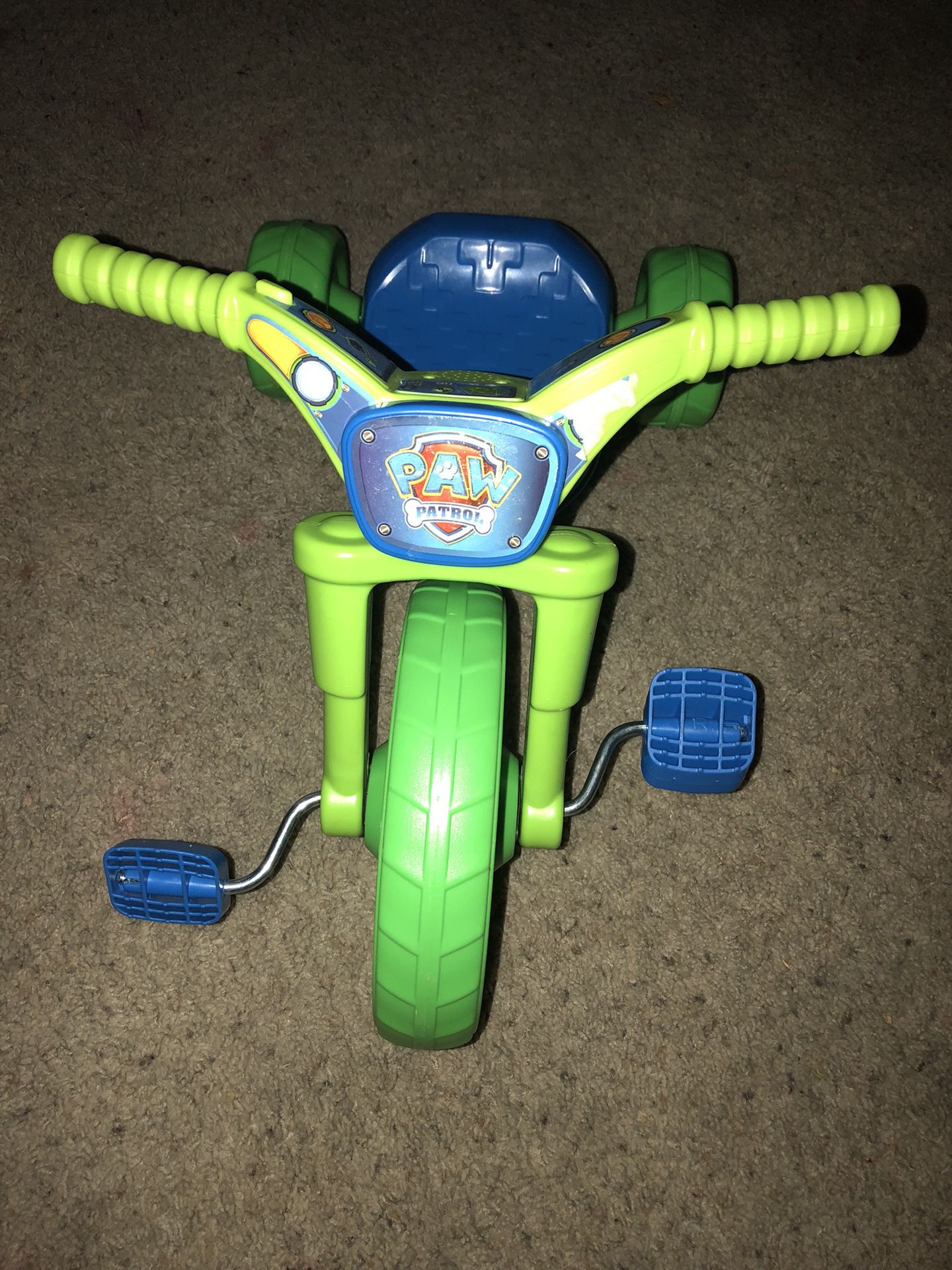 Musical paw patrol trike and helmet. Never used out of box