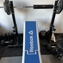 Reebok bench With Independent Squat Bench Stands Weight Plates Included