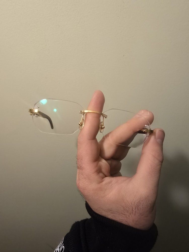 Authentic Cartier C Decore Glasses With Serial Number & 2 Pair Of Authentic Mens Prada Glasses  1300 FOR ALL 3 PAIRS (PRICE NEGOTIABLE) 