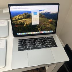 Apple 15” MacBook Pro 2019 Touch Bar 2.3ghz 8 Core Intel Core i9 32gb RAM 512gb Flash macOS Sonoma 4gb Dedicated AMD Radeon Graphics Card 
