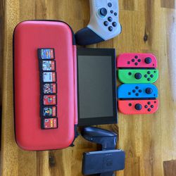 Nintendo switch With Remotes And Games