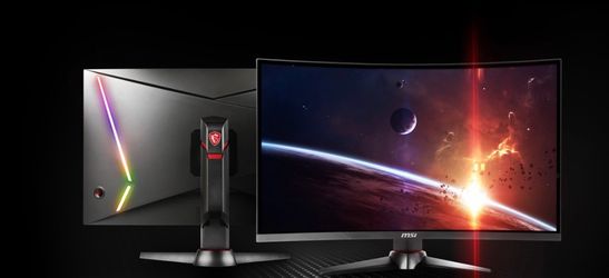 Two MSI curved monitors with desk mount arms