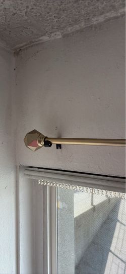 2 gold curtain rods