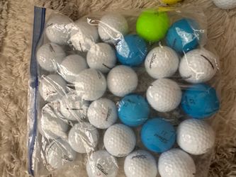 60 assorted golf balls