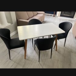 47.2" Dining Table for 4 Person - Rectangular Kitchen Table with Soild Wood Legs Mid Century Modern Table for Dinning Room, Kitchen, And 4 Black Faux 