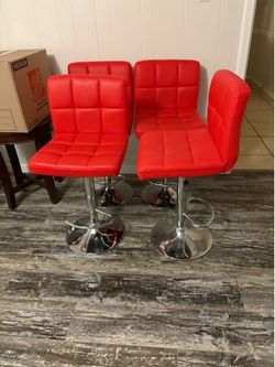 4 Red faux leather bar stools