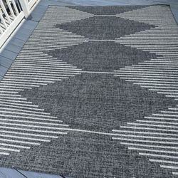 Abdulazeez Irielle Geometric Black Indoor/Outdoor Area Rug By Wade Logan