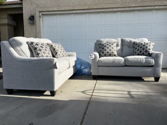 Brand New. (Set of 2) Lane Love Seat Sofa’s. Tweed color with accent pillows.  $549