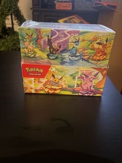 Prismatic Evolutions Sealed Tin Display