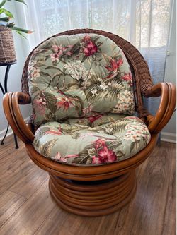 GARAGE SALE SATURDAY!  Beautiful cane swivel rocker with gorgeous cushions