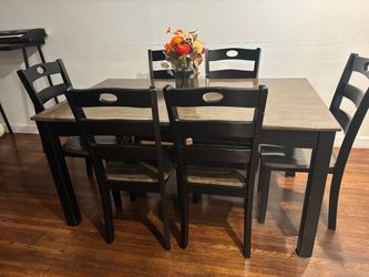 Ashley furniture Dining table 6 chairs in Downey, does not wobble