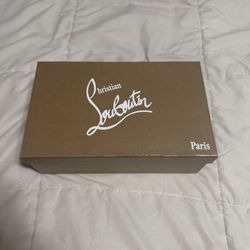 christian louboutin red bottoms grey