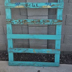 Pool Towel Rack Has Hooks On The Side.