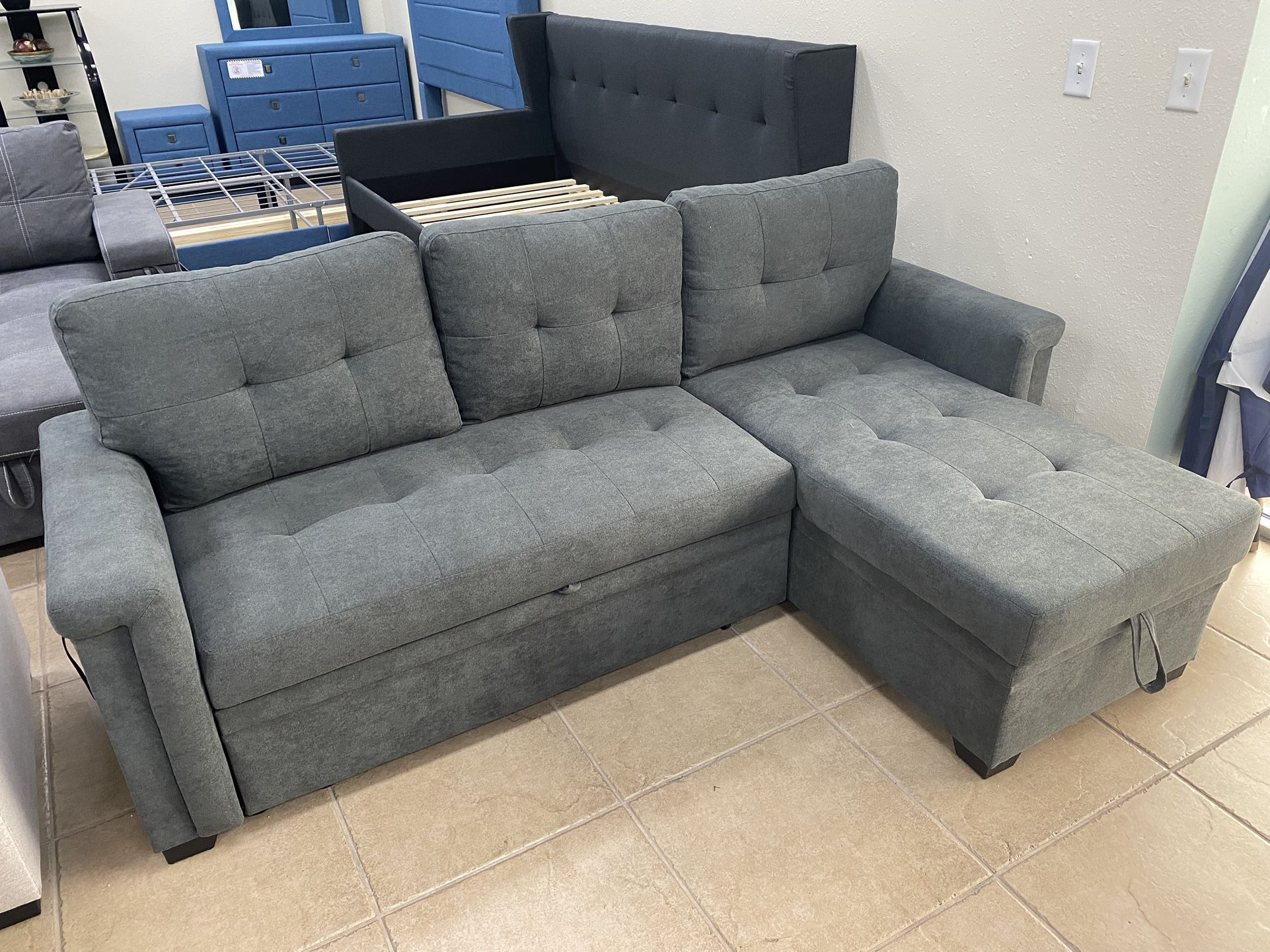 Two-Piece Reversible Sleeper Sectional With Storage $399