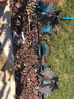 Pair of metal garden figures.. 31x21