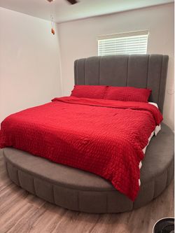 Charcoal, gray, circular king sized bed with mattress included
