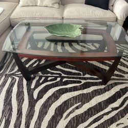 Two Glass Top And Tables And A Coffee Table Matching