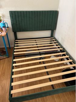 Green velvet bed frame with mattress