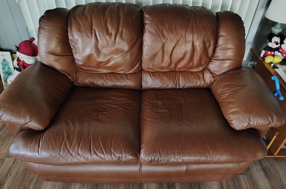 LEATHER LOVESEAT AND OVERSIZED CHAIR