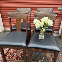 Wooden high table and four chairs