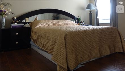 Queen sized bed headboard with two night stands and four drawers