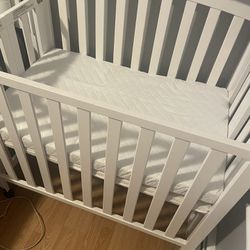 White Mini Crib
