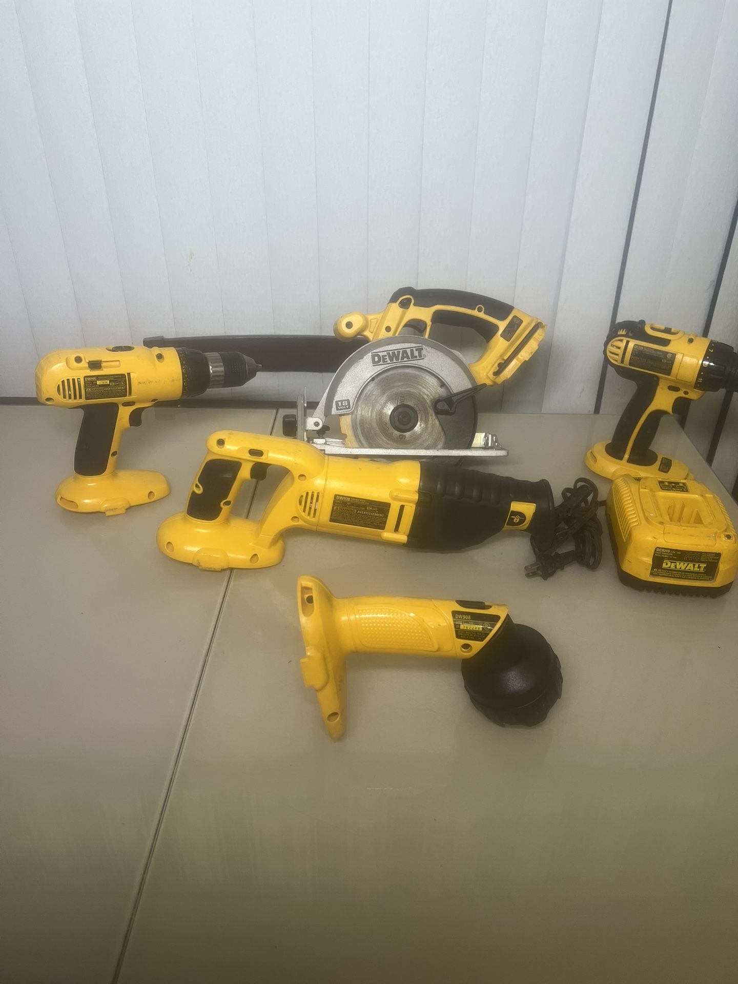 Lot Of DEWALT DW938 18V, DEWALT DW908, DEWALT DW390, DEWALT DC720, DEWALT DW995 . No batteries and one charger. All works   Used in good condition wit