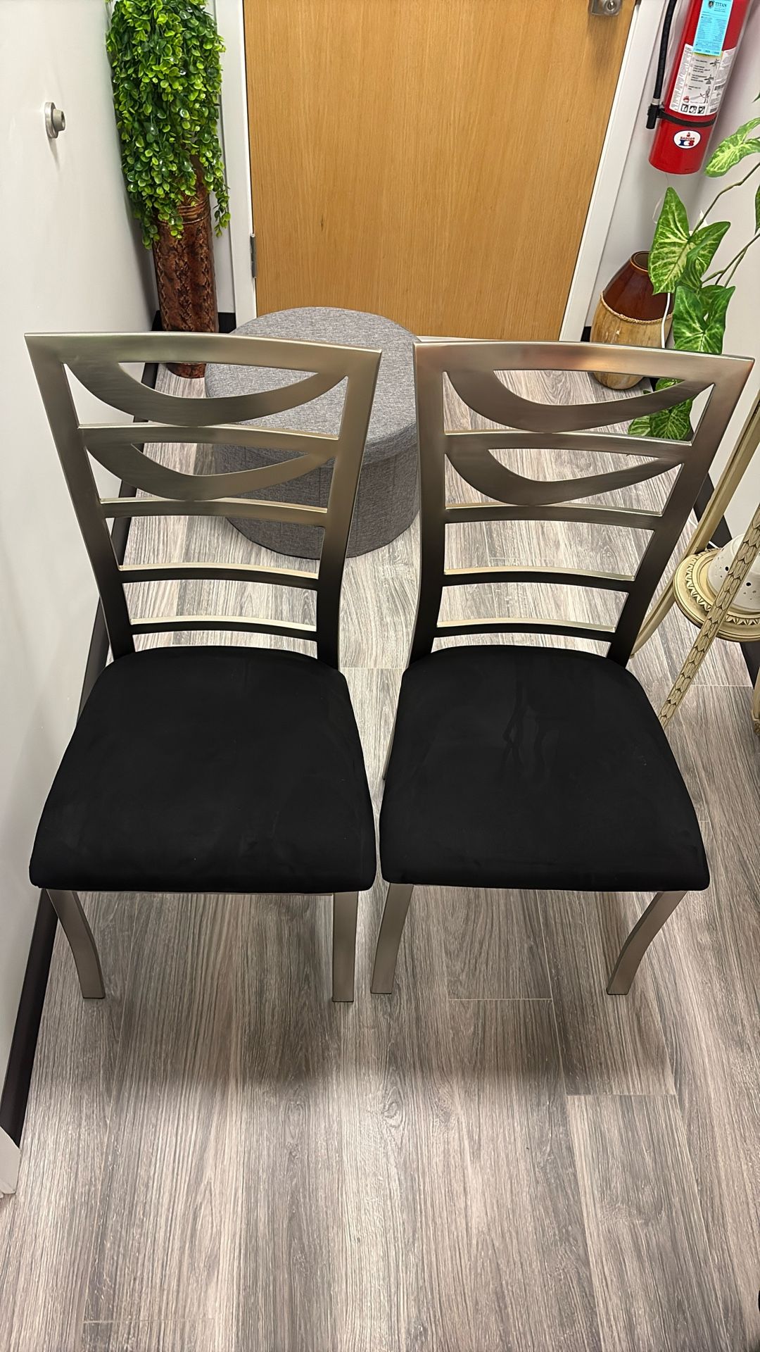 Silver Metals Chairs With black cushion