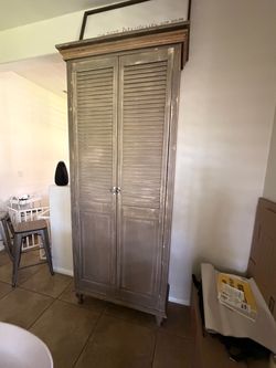 Tall Wood Armoire with Louvered Doors
