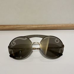 PRADA Sunglasses- 65TS Pale Gold Frame Unique Silver Mirror Lens