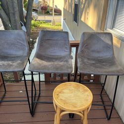 Three Used Barstools and one small Stool for 65$