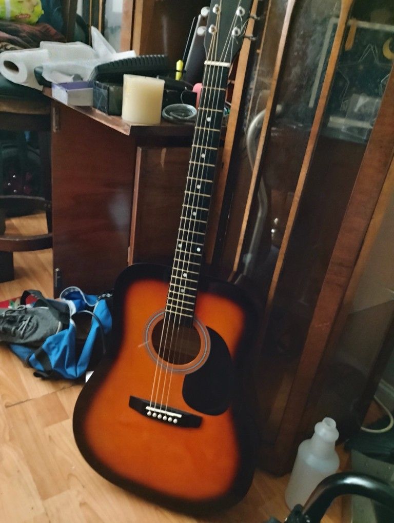 sonart acoustic guitar brand new.