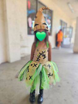 green and burlap-style tutu costume inspired by Oogie Boogie from The Nightmare Before Christmas.